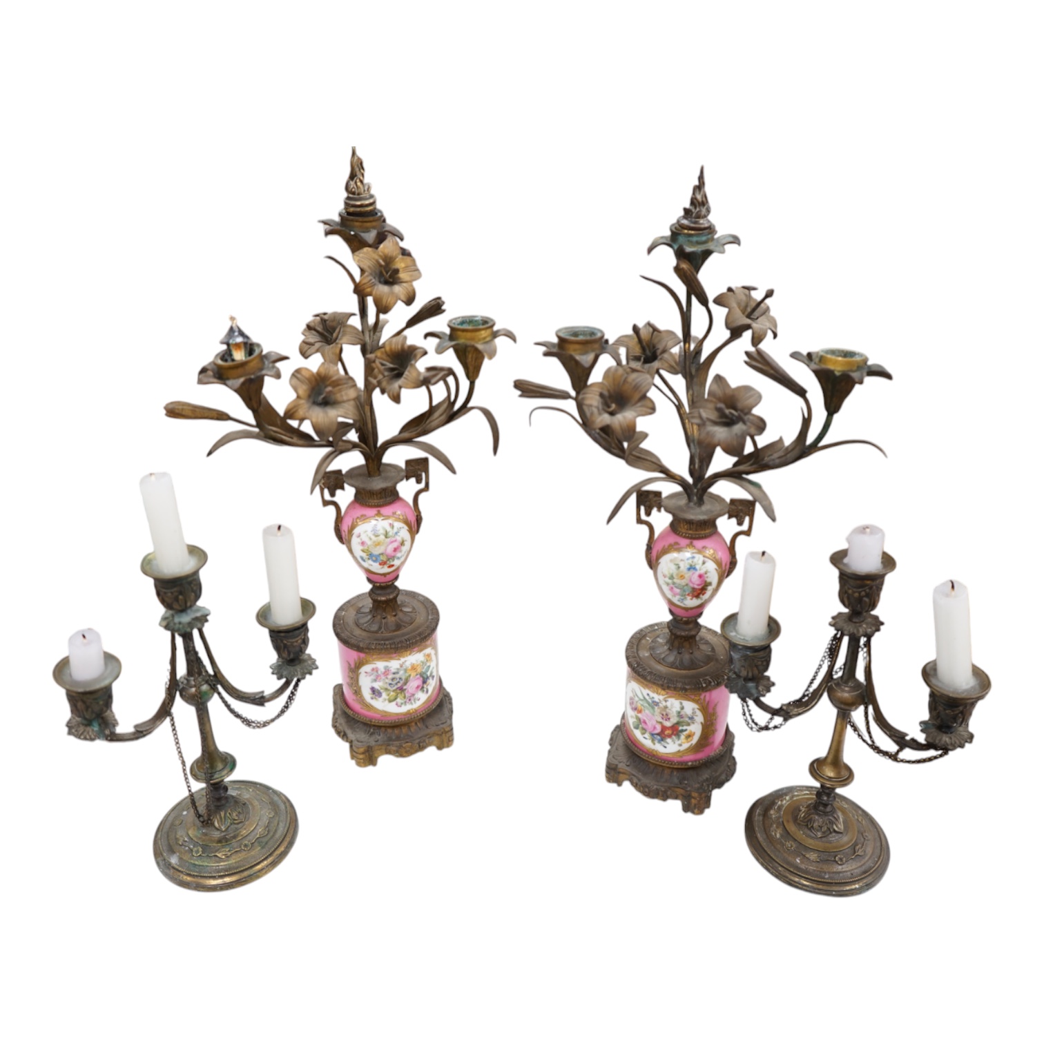 A pair of French porcelain mounted gilt metal candelabra and one other pair, tallest 45cm. Condition - fair